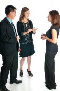 ASL interpreter providing services during an interview.