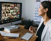 A woman engaging in a webinar.